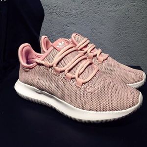 Light pink adidas tubular shadows